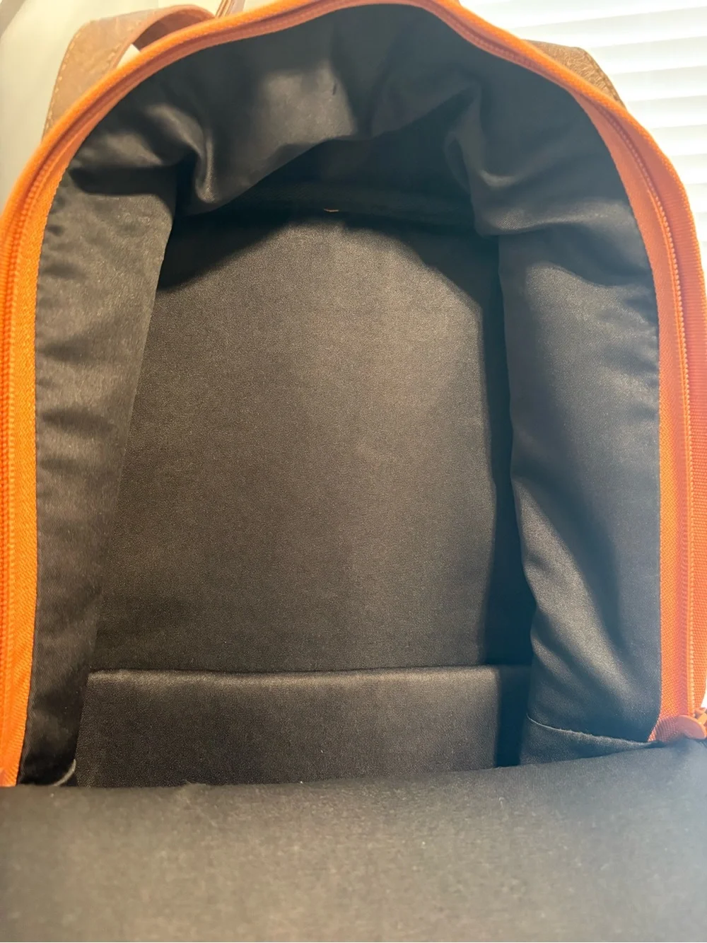Orange Canvas Backpack with Brown Accents